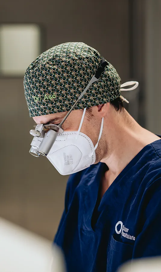 Dr. Jorge Aso in the operating room during breast surgery